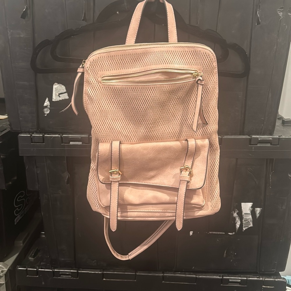 Blush perforated backpack